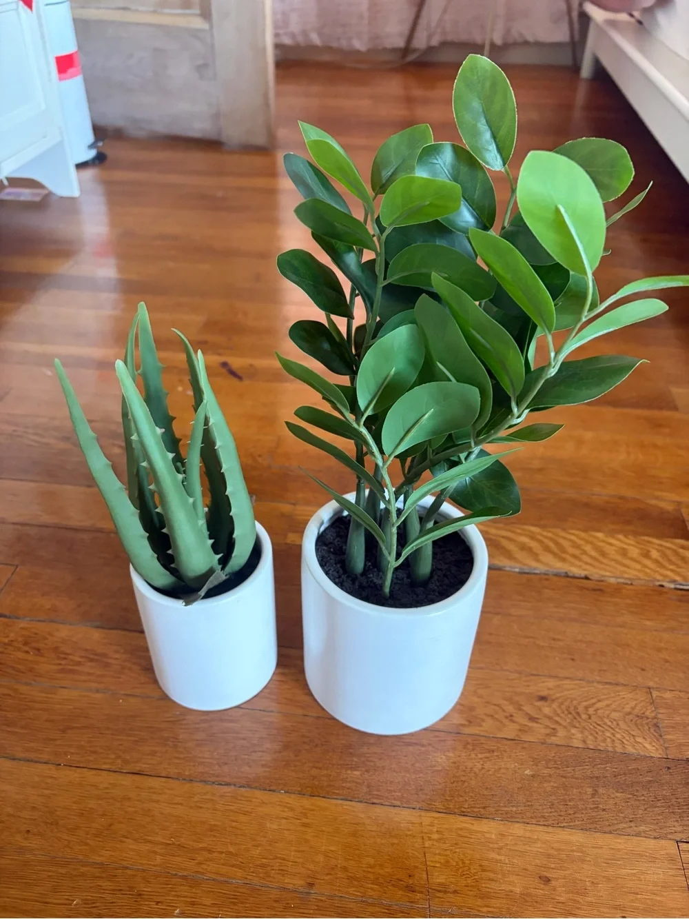 Green Faux Potted Plant in White Ceramic Planter